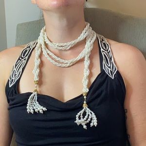 Multi-strand 60” white pearl rope with tassel ends
